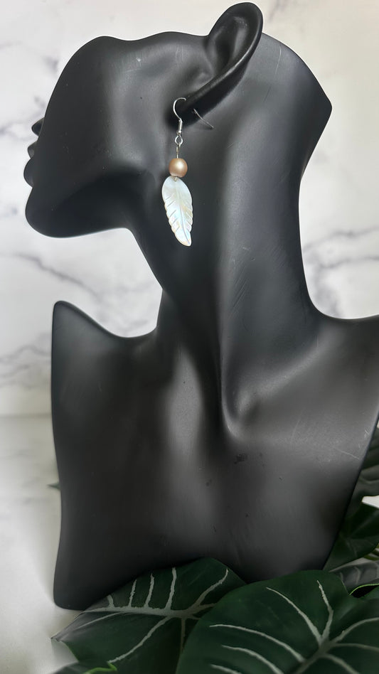 Pearlescent white feather earrings